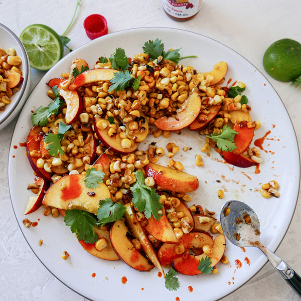 Blistered Corn and Peach Salad with Hot Sauce and Lime